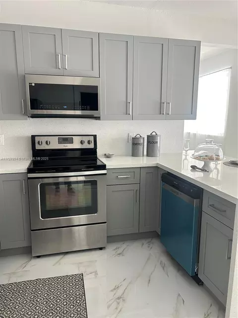 Kitchen - 437 W 76th St, Hialeah, FL 33014 photo 2 of 5