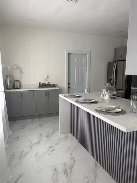 Kitchen - 437 W 76th St, Hialeah, FL 33014 photo 4 of 5