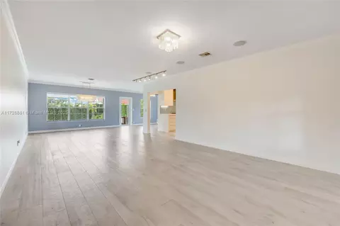 Living - 8934 Emerson Ave, Surfside, FL 33154 photo 2 of 5