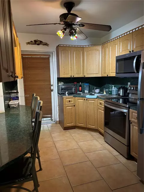 Kitchen - 1481 E 6th Ave, Hialeah, FL 33010 photo 2 of 2