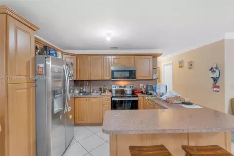 Kitchen - 101 W 17th St, Hialeah, FL 33010 photo 1 of 2