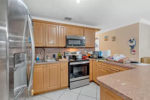 Kitchen - 101 W 17th St, Hialeah, FL 33010 photo 2 of 2