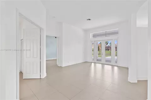 Living - 10575 E Key Dr, Boca Raton, FL 33498 photo 2 of 7