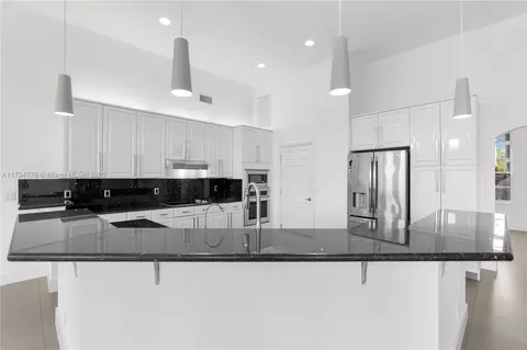 Kitchen - 10575 E Key Dr, Boca Raton, FL 33498 photo 3 of 6