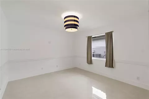 Bedroom - 10575 E Key Dr, Boca Raton, FL 33498 photo 4 of 5