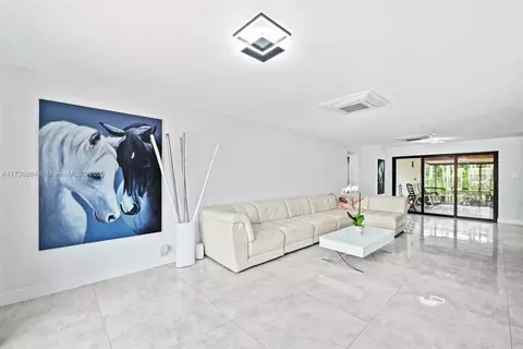 Living - 901 Apache St, Miami Springs, FL 33166 photo 1 of 1