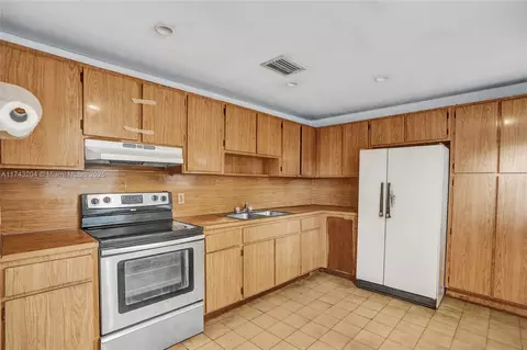 Kitchen - 660 E 8th Ln, Hialeah, FL 33010 photo 1 of 1