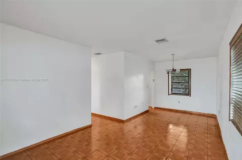 Living - 660 E 8th Ln, Hialeah, FL 33010 photo 1 of 2
