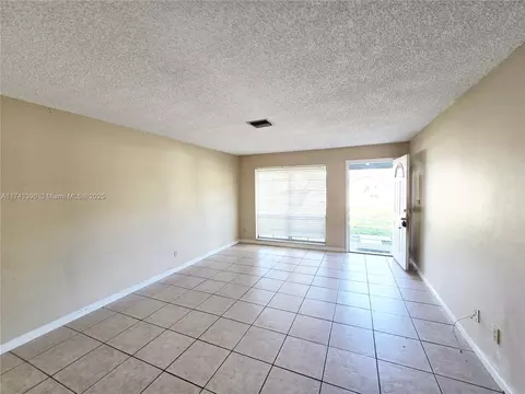 Living - 4552 SE Ontario Dr, Stuart, FL 34997 photo 2 of 2
