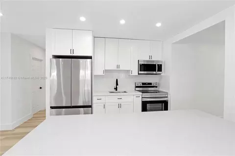 Kitchen - 720 NE 2nd Pl, Hialeah, FL 33010 photo 1 of 2
