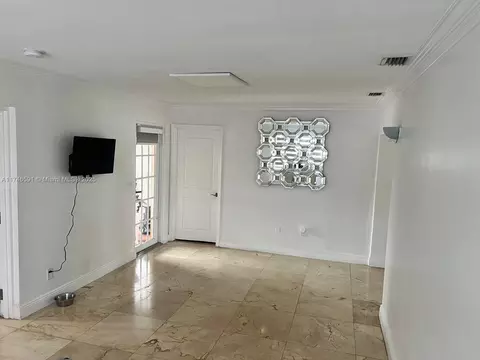 Living - 766 E 48th St, Hialeah, FL 33013 photo 2 of 2