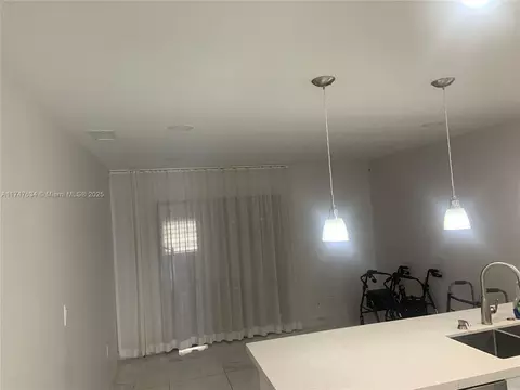 Living - 806 W 73rd Pl, Hialeah, FL 33014 photo 2 of 3