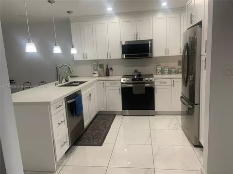 Kitchen - 806 W 73rd Pl, Hialeah, FL 33014 photo 1 of 2