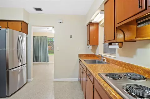 Kitchen - 472 W 15th St, Hialeah, FL 33010 photo 2 of 3