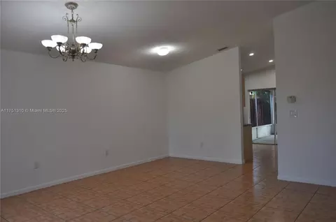 Living - 7001 W 35th Ave, Hialeah, FL 33018 photo 2 of 2