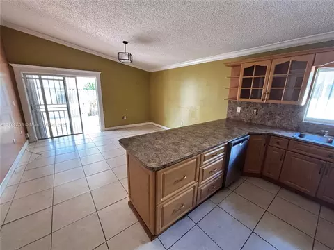 Living - 3162 W 69th Pl, Hialeah, FL 33018 photo 2 of 3