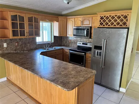 Kitchen - 3162 W 69th Pl, Hialeah, FL 33018 photo 1 of 1