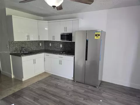 Kitchen - 831 E 13th St, Hialeah, FL 33010 photo 4 of 5