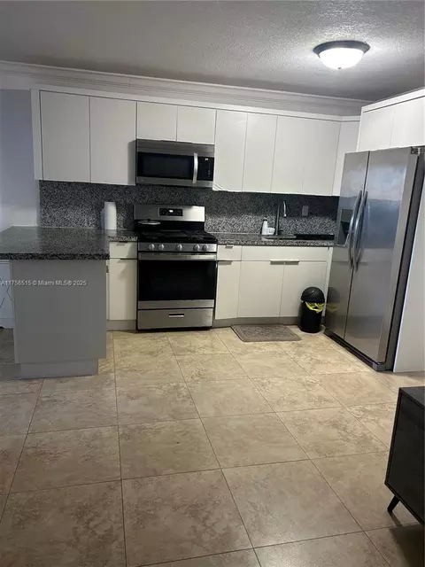 Kitchen - 831 E 13th St, Hialeah, FL 33010 photo 1 of 5