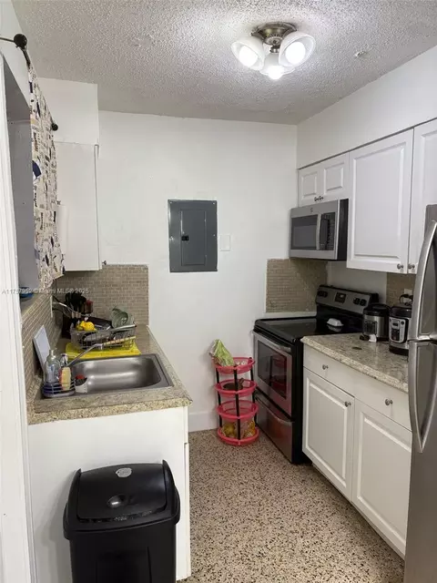 Kitchen - 250 E 10th St, Hialeah, FL 33010 photo 2 of 2
