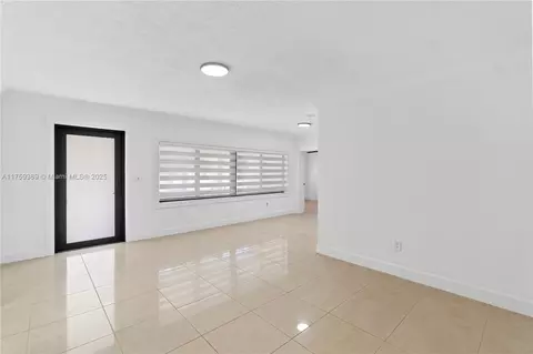 Living - 501 E 33rd St, Hialeah, FL 33013 photo 2 of 7
