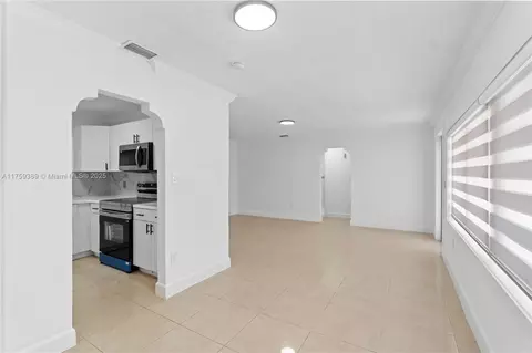 Living - 501 E 33rd St, Hialeah, FL 33013 photo 3 of 7