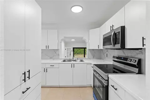 Kitchen - 501 E 33rd St, Hialeah, FL 33013 photo 1 of 4
