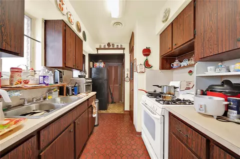 Kitchen - 727 E 26th St, Hialeah, FL 33013 photo 1 of 2