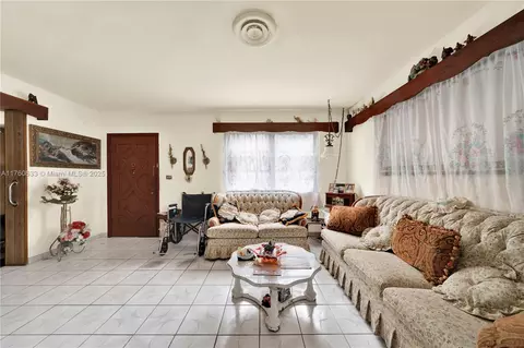 Living - 727 E 26th St, Hialeah, FL 33013 photo 2 of 3