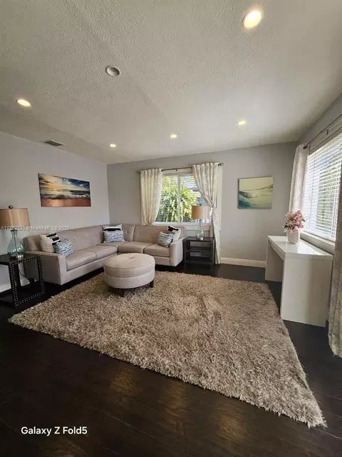 Living - 653 E 43rd St, Hialeah, FL 33013 photo 1 of 2