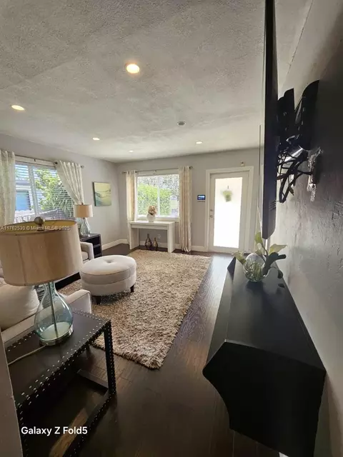 Living - 653 E 43rd St, Hialeah, FL 33013 photo 2 of 2
