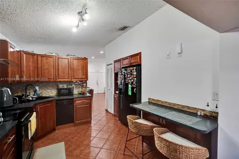 Kitchen - 3355 W 68th St Unit #120, Hialeah, FL 33018 photo 3 of 3