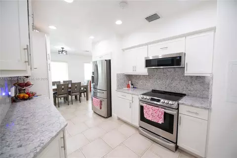 Kitchen - 130 W 36th St, Hialeah, FL 33012 photo 2 of 2