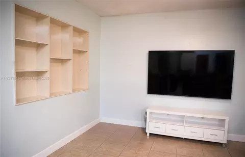 Living - 130 W 36th St, Hialeah, FL 33012 photo 7 of 8