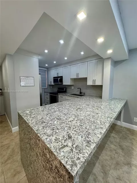 8437 Forest Hills Dr #103, Coral Springs, FL 33065