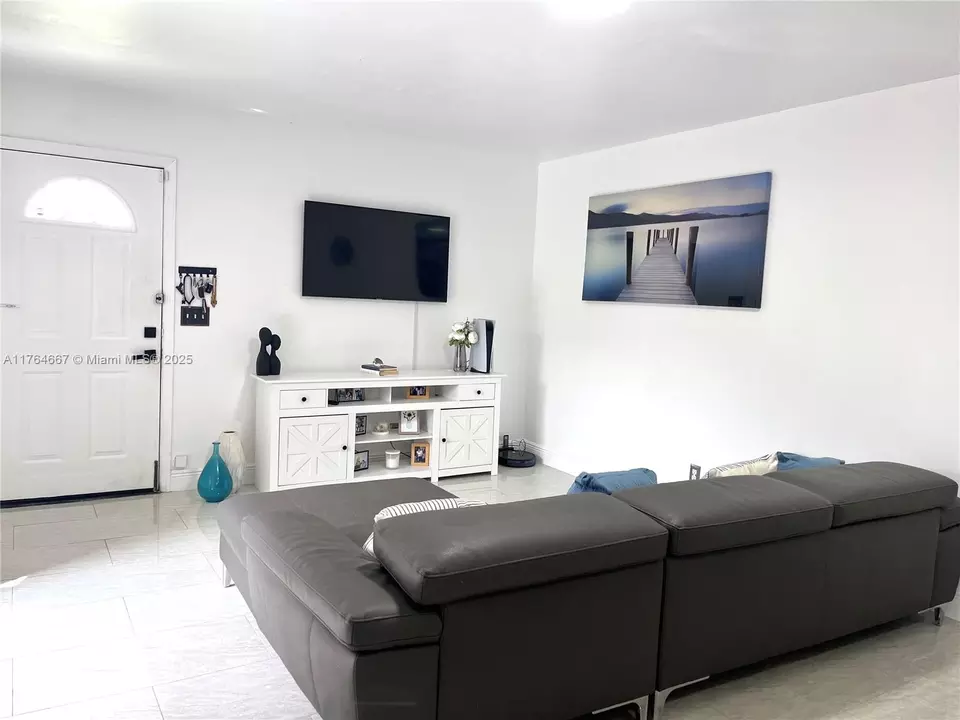 Living - 6126 Seven Springs Blvd, Greenacres, FL 33463 photo 1 of 2