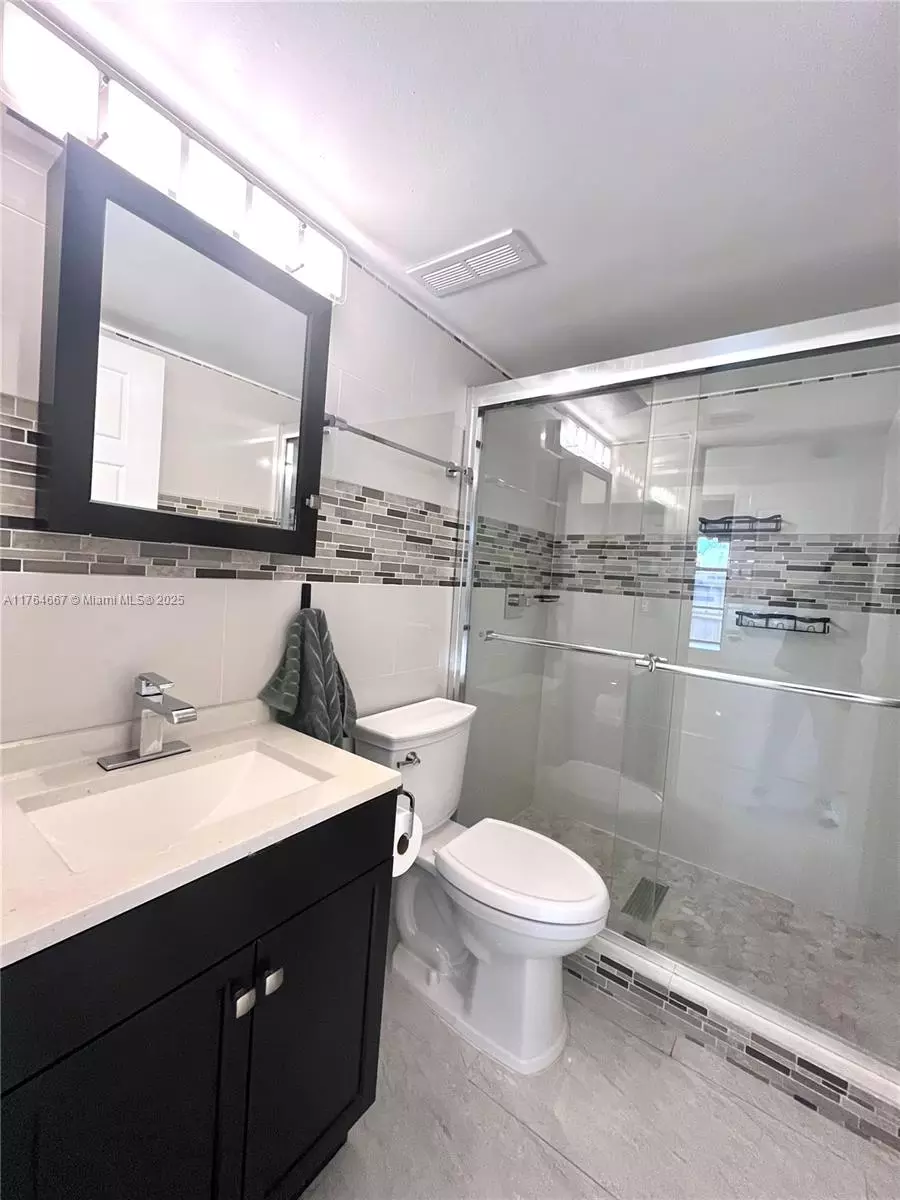 Bath - 6126 Seven Springs Blvd, Greenacres, FL 33463 photo 2 of 6