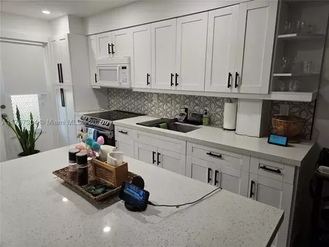 1550 NE 191st #107, Miami, FL 33179