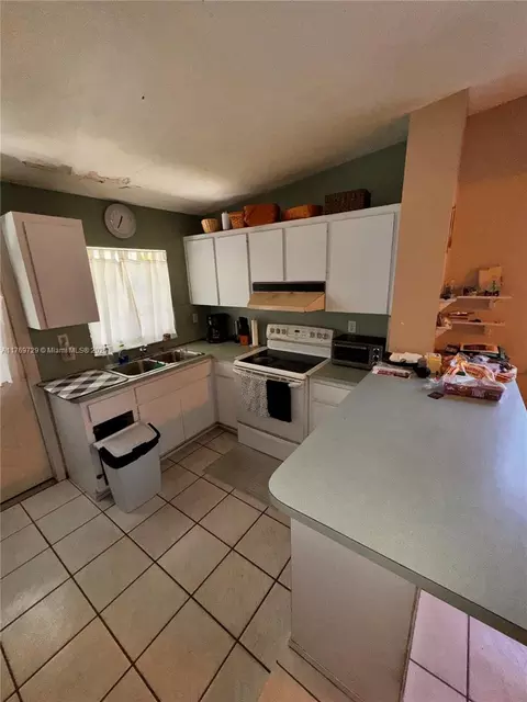 Kitchen - 30 E 59th St, Hialeah, FL 33013 photo 2 of 2