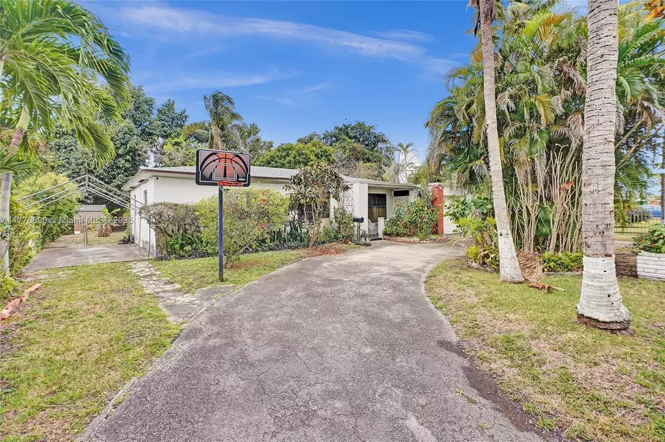 Exterior - 1930 NW 132nd St, Miami, FL 33167 photo 3 of 12