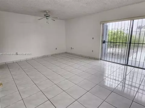 Living - 857 W 79th Pl, Hialeah, FL 33014 photo 2 of 2