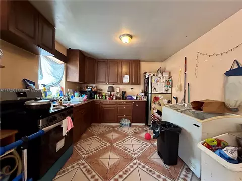 Kitchen - 1940 Ali Baba Ave, Opa Locka, FL 33054 photo 1 of 3