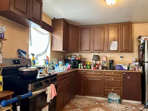 Kitchen - 1940 Ali Baba Ave, Opa Locka, FL 33054 photo 2 of 3