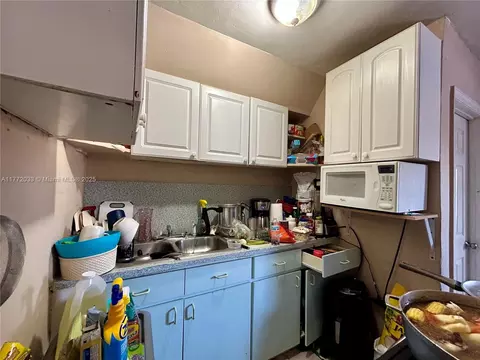 Kitchen - 1940 Ali Baba Ave, Opa Locka, FL 33054 photo 3 of 3