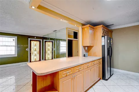 Kitchen - 390 E 44th St, Hialeah, FL 33013 photo 3 of 4