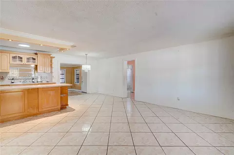 Living - 390 E 44th St, Hialeah, FL 33013 photo 3 of 6