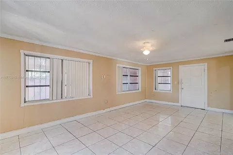 Living - 390 E 44th St, Hialeah, FL 33013 photo 5 of 6