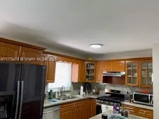 Kitchen - 1012 E 20th St, Hialeah, FL 33013 photo 1 of 2