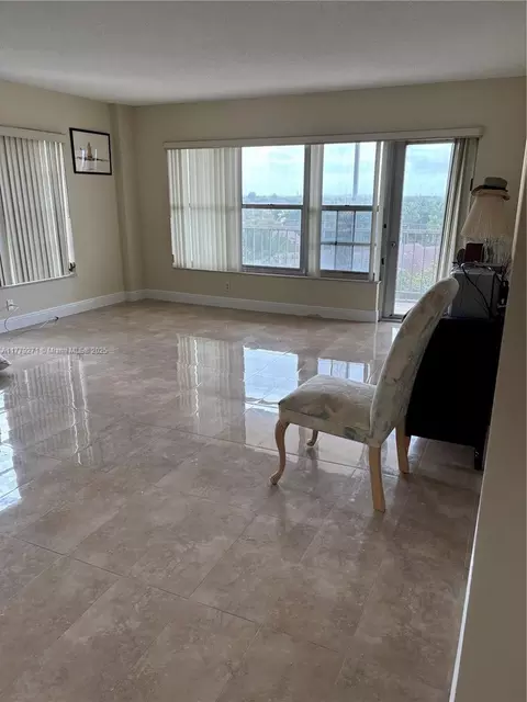 Living - 10777 W Sample Rd #714, Coral Springs, FL 33065 photo 4 of 9
