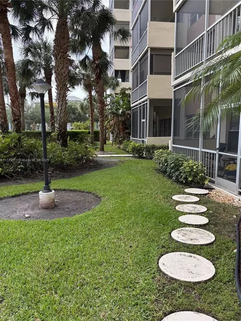 Exterior - 10777 W Sample Rd #714, Coral Springs, FL 33065 photo 2 of 3